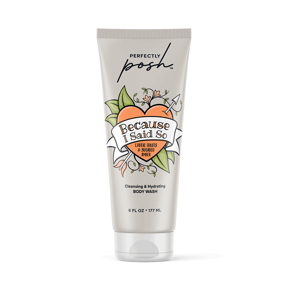 A beige 6 fl oz (177 mL) tube of Perfectly Posh Because I Said So Cleansing & Hydrating Body Wash features tropical fruit and leaf art, and contains aloe and hyaluronic acid for hydration.
