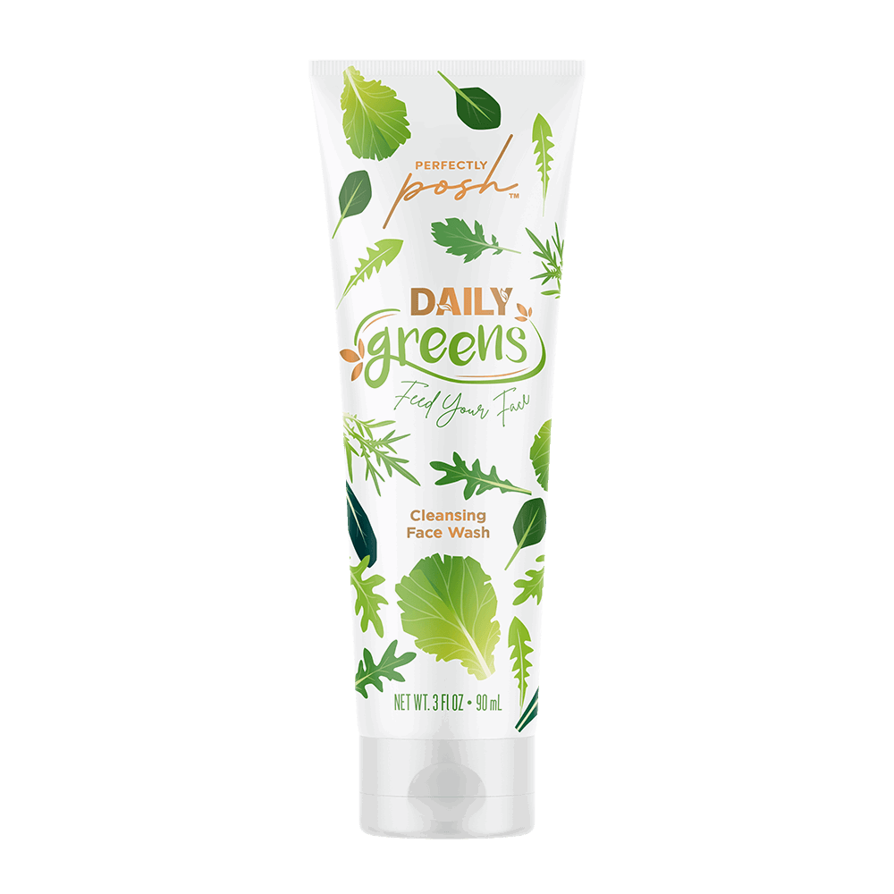 A 3 fl oz tube of Perfectly Posh Daily Greens Cleansing Face Wash, featuring green leaf art and colorful text on white—a gentle cleanser with green tea for glowing skin.