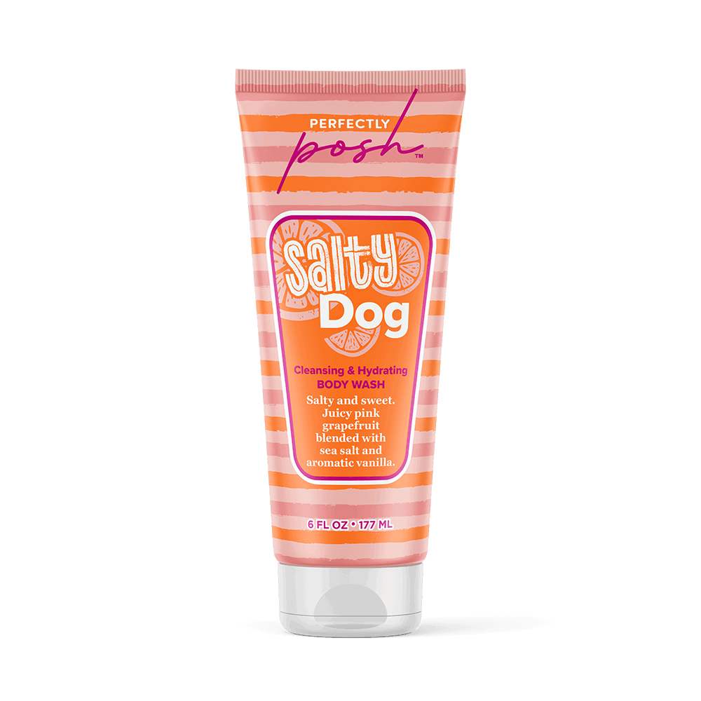 A 6 fl oz (177 ml) tube of Perfectly Posh Salty Dog Cleansing & Hydrating Body Wash with orange and pink stripes, featuring pink grapefruit, sea salt, and vanilla for fresh, clean skin.
